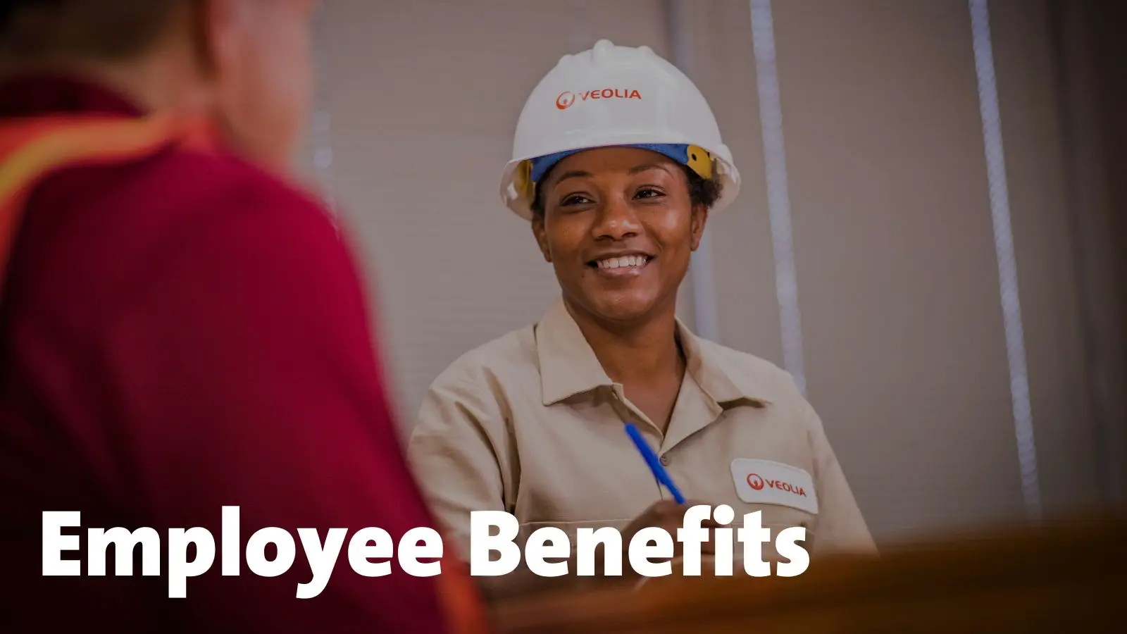 Female worker with Employee Benefits verbiage